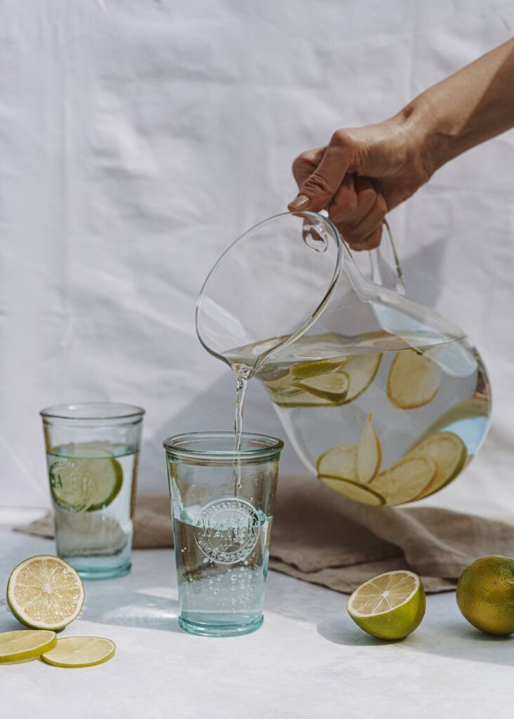 glass jug with water and lime