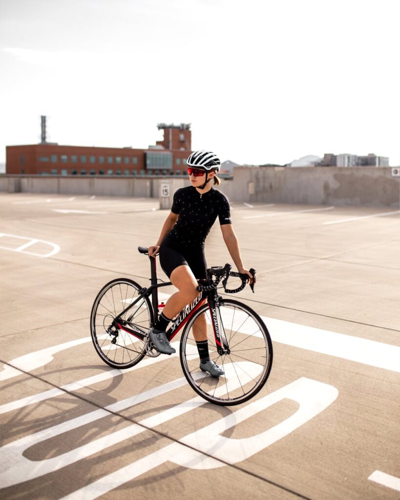 photo of woman riding bicycle