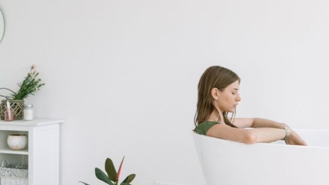 photo of woman in bathtub